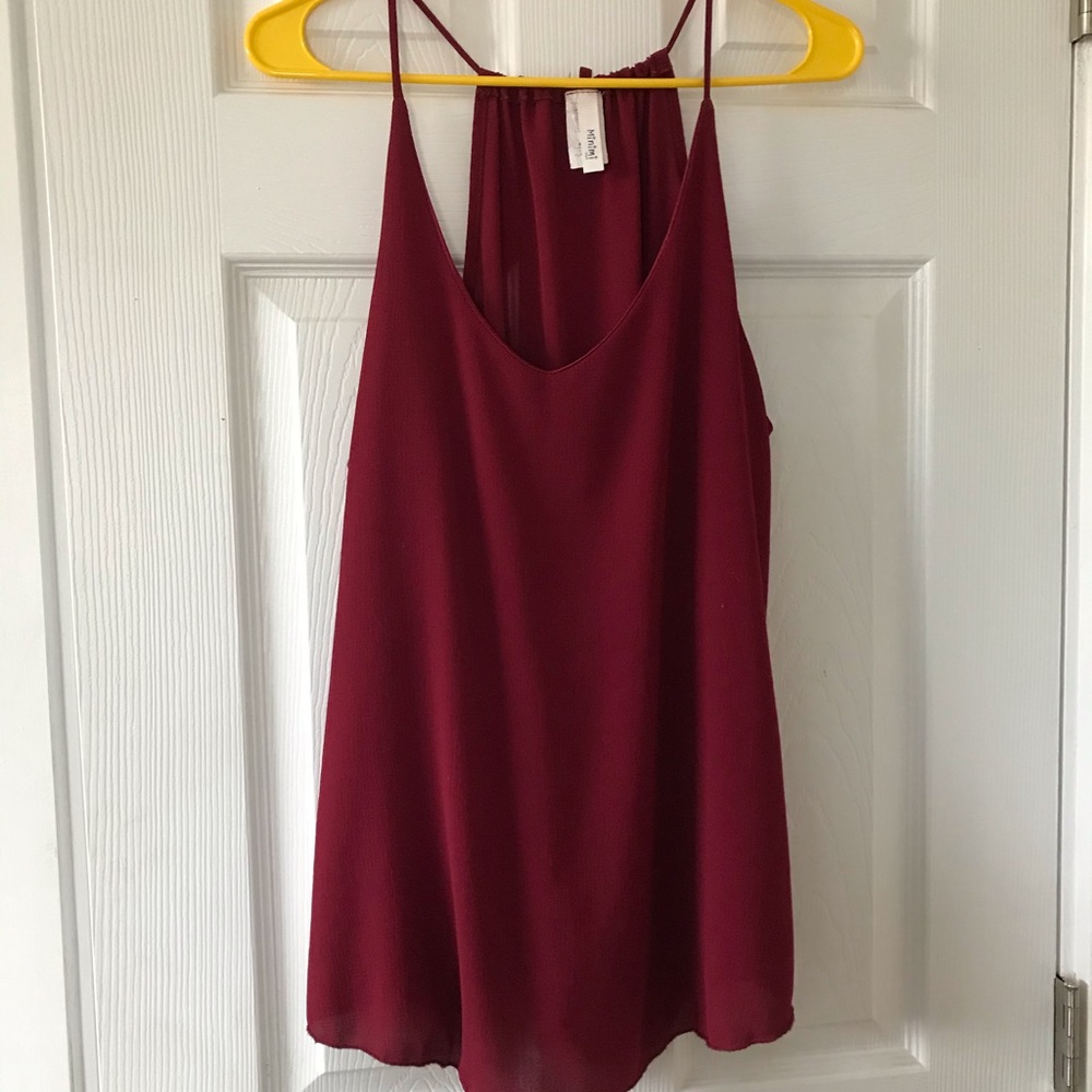 Maroon flows blouse.